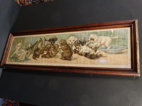 Yard of Puppies, is an Antique Chromolithograph. Yard long in width, weathered frame.